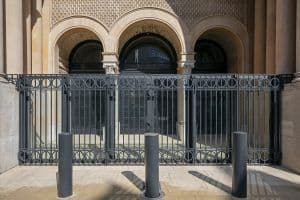 full view of black iron gates