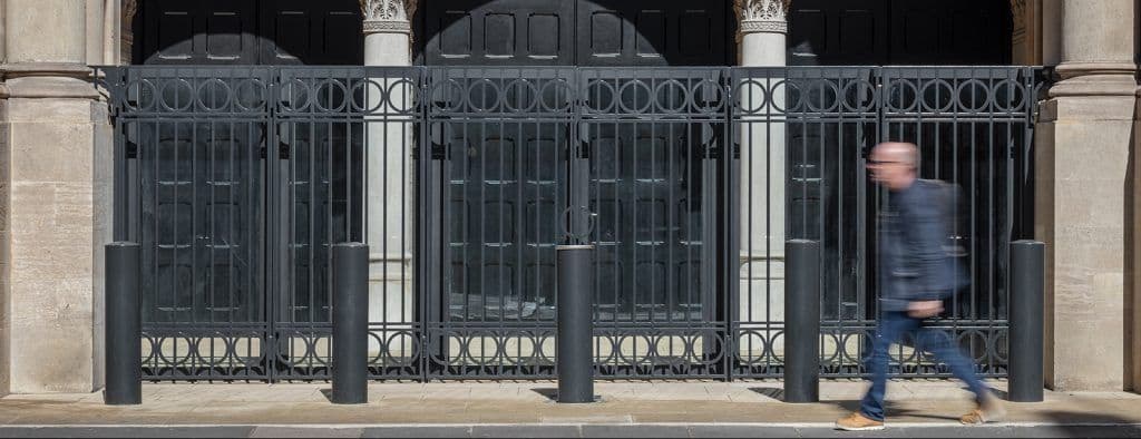 black gates outside a building in london